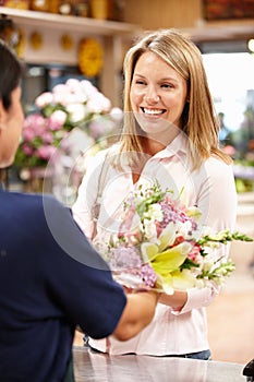 Woman shopping in florist