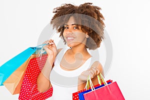 Woman shopping. Happy young african american girl with shopping bags isolated on white background. Copy space. Mock up. Summer