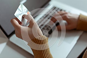 Woman shopping making Payment at Computer using Credit Card