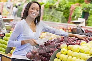 Woman shopping in produce department