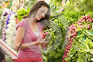 Woman shopping in produce section