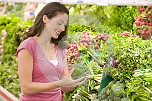 Woman shopping in produce section