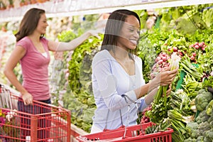 Woman shopping in produce section