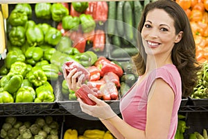 Woman shopping in produce section