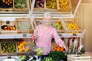 Woman shopping in small grocery store