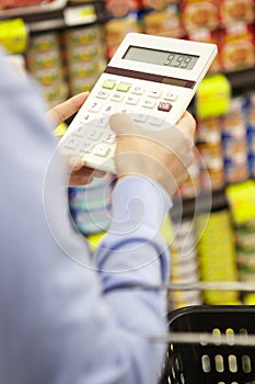 Woman shopping in supermarket