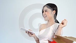 Woman shopping and using digital tablet