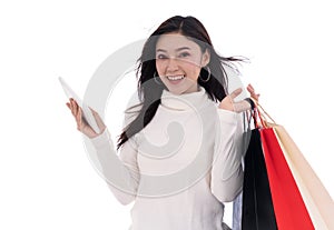 Woman shopping and using digital tablet isolated on a white back