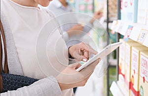 Woman shopping and using a tablet