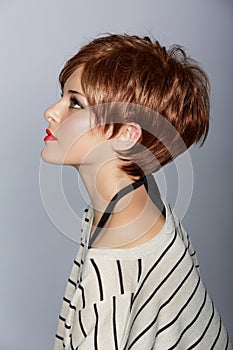 Woman with short red hair