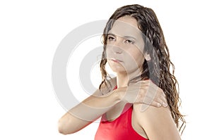 Woman with shoulder pain or stiffness, her hand in her shoulder.