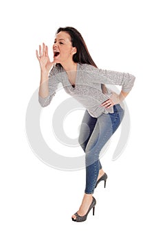 Woman shouting with hand on her face