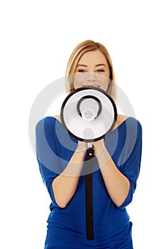 Woman shouting with a megaphone