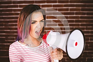 Woman shouting on megaphone