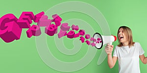 Woman shouting with megaphone, loudspeaker on studio background. Sales, offer, business, cheering fun concept.