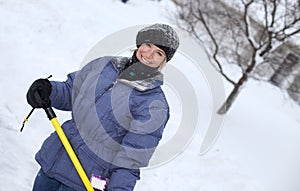 Woman shoveling