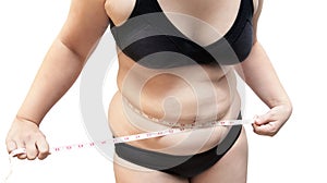 Woman show body fat wearing black underwear bra on white isolated