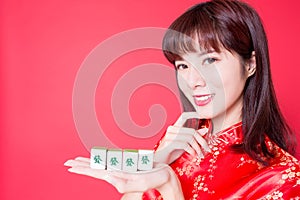 Woman show mahjong to you