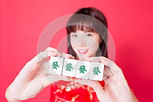 Woman show mahjong to you