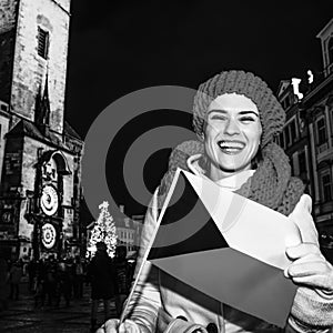 Woman showing Czech flag on Staromestske namesti in Prague photo