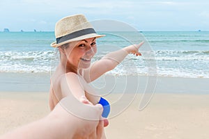 A woman is showing a finger to her companion