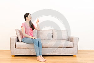 Woman showing gestures pointing with copyspace