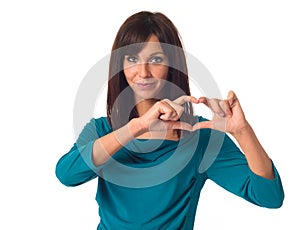 Woman showing heart shape