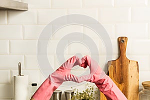 Woman showing heart shape with her hands