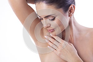 Woman showing her armpit.