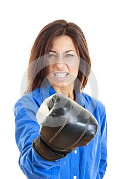 Woman showing her fist with boxer glove in front of camera