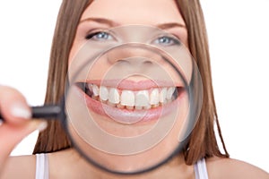 Woman showing her healthy teeth