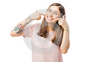 Woman Showing Her Perfect Straight White Teeth photo