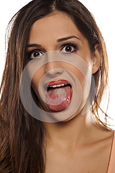 Woman showing her tongue