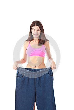 Woman showing how much weight she lost