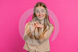 Woman showing a little bit gesture with sceptic smile showing minimum sign measuring small size