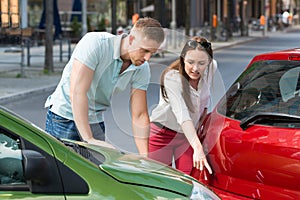 Woman Showing Man Car Collision