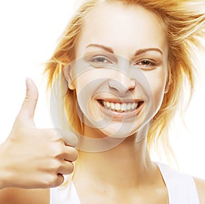 Woman showing OKAY sign and smiling