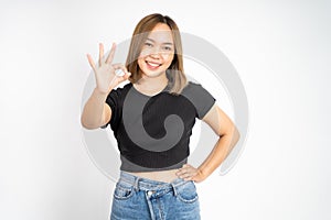 woman showing oke gesture with hands near eye looks imitating binocular