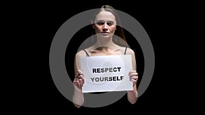 Woman showing respect yourself sign, positive attitude to personality and body