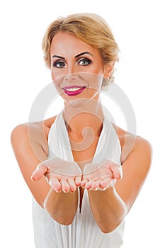 Woman showing something on the palms of her hands