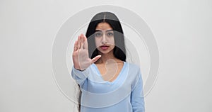 Woman showing stop gesture with hand