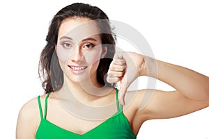Woman showing thumbs down photo
