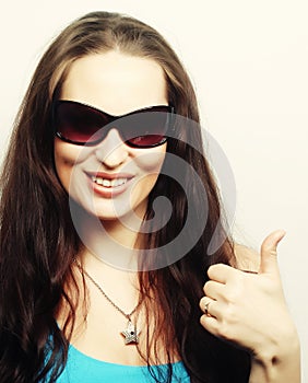 woman showing thumbs up