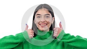 Woman Showing Thumbs Up Gesture With Both Hands Over White Background