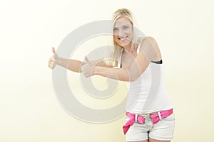 Woman showing two thumbs up