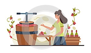 Woman showing wine making process. Extraction of grape juice from berries