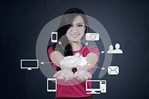 Woman shows cloud computing icons