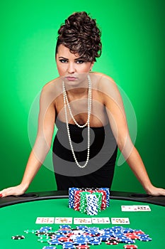 woman shows poker hand