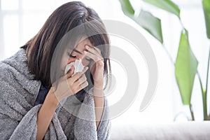 Woman sick and sneeze photo