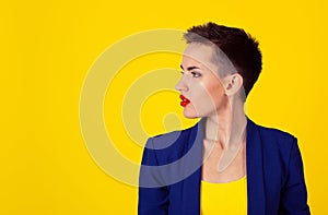 Woman in side profile thinking looking to left serious